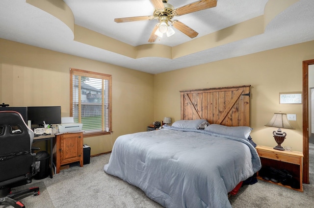 413 W Chestnut Rd, Nixa, MO 65714 - bedroom with light colored carpet, a raised ceiling, an office area, and ceiling fan