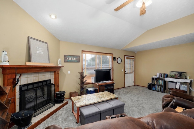 413 W Chestnut Rd, Nixa, MO 65714 - carpeted living area with lofted ceiling, a fireplace, ceiling fan, and baseboards