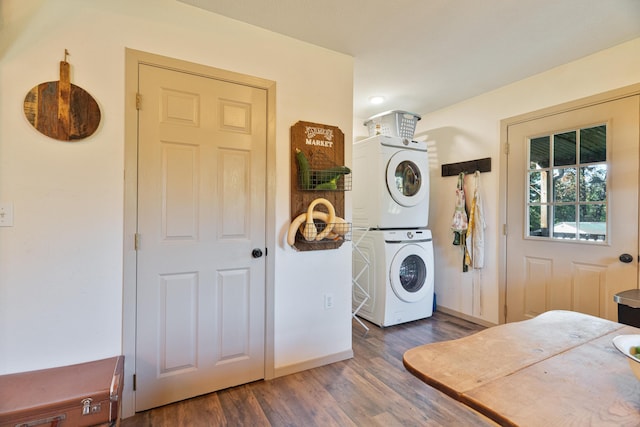 1899 State Highway Dd, Ava, MO 65608 - laundry room with stacked washing machine and dryer, wood finished floors, and baseboards