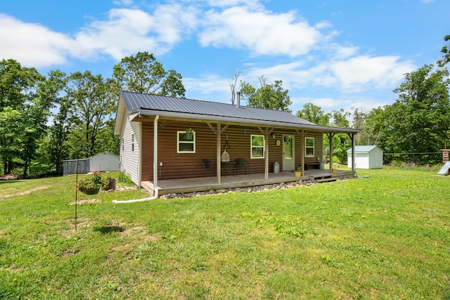 1899 State Highway Dd, Ava, MO 65608 - view of front of property featuring a porch, metal roof, a front lawn, and log veneer siding