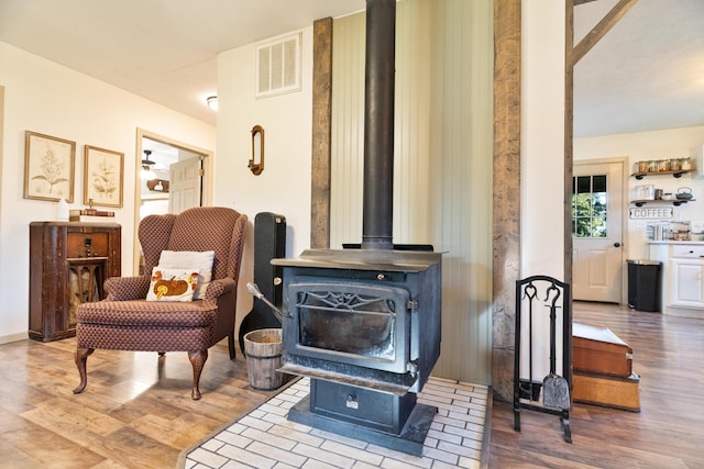 1899 State Highway Dd, Ava, MO 65608 - sitting room featuring a wood stove and wood finished floors