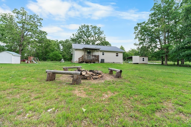 1899 State Highway Dd, Ava, MO 65608 - view of grassy yard with a playground and a wooden deck