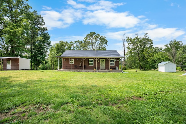 1899 State Highway Dd, Ava, MO 65608 - chalet / cabin with covered porch, a front yard, and metal roof