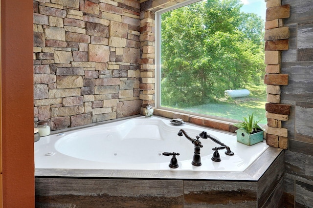 8403 Lawrence Unit 1040, La Russell, MO 64848 - full bathroom with a jetted tub and healthy amount of natural light