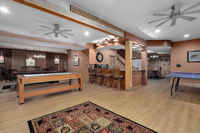 8403 Lawrence Unit 1040, La Russell, MO 64848 - recreation room with ceiling fan, a community bar, beam ceiling, wood finished floors, and recessed lighting