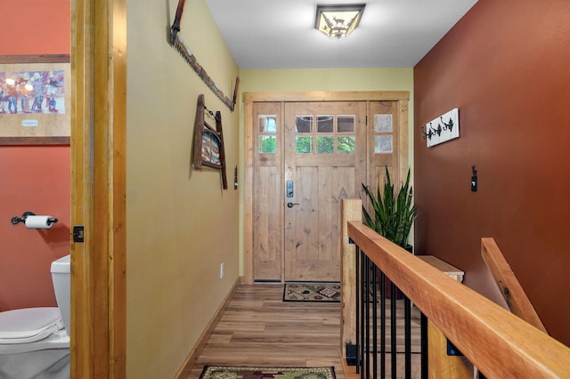 8403 Lawrence Unit 1040, La Russell, MO 64848 - entrance foyer with wood finished floors and baseboards