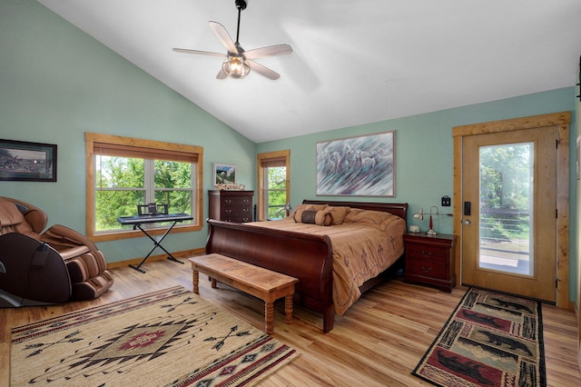 8403 Lawrence Unit 1040, La Russell, MO 64848 - bedroom featuring access to exterior, light wood-style floors, vaulted ceiling, ceiling fan, and baseboards