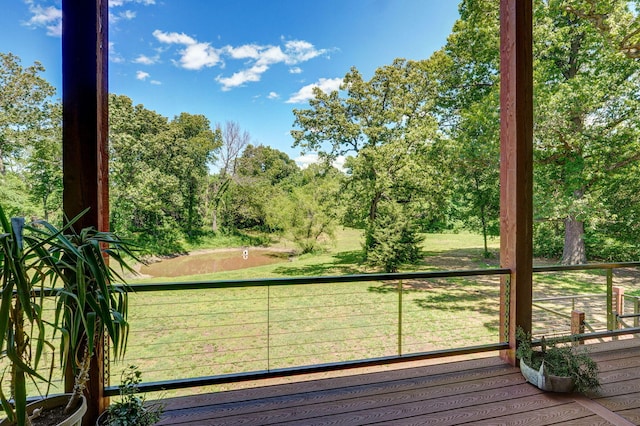 8403 Lawrence Unit 1040, La Russell, MO 64848 - view of yard featuring a balcony and view of scattered trees