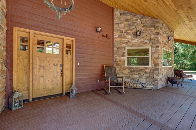 8403 Lawrence Unit 1040, La Russell, MO 64848 - entrance to property with stone siding and a porch