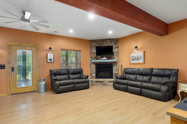 8403 Lawrence Unit 1040, La Russell, MO 64848 - living room featuring wood finished floors, a stone fireplace, ceiling fan, and recessed lighting