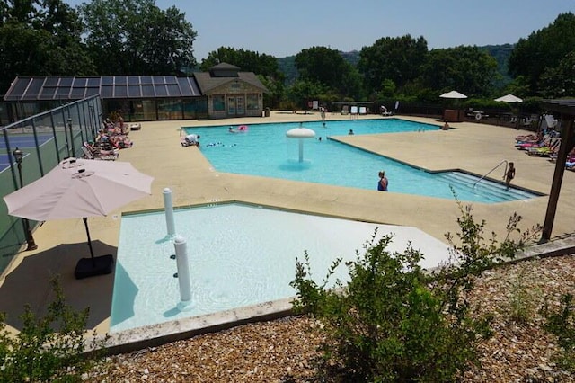280 Wimbledon Dr Unit 8, Branson, MO 65616 - community pool with a patio area