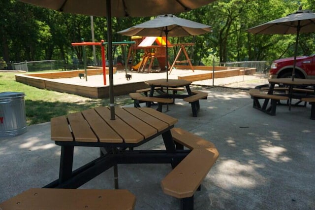 280 Wimbledon Dr Unit 8, Branson, MO 65616 - view of property's community with outdoor dining area and a patio