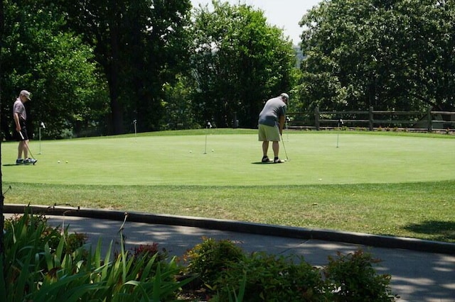 280 Wimbledon Dr Unit 8, Branson, MO 65616 - view of home's community with a putting green and view of scattered trees