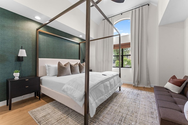 280 Wimbledon Dr Unit 8, Branson, MO 65616 - bedroom featuring wood finished floors, baseboards, and high vaulted ceiling