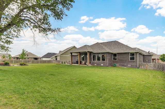 735 N Fox Hill Cir, Nixa, MO 65714 - rear view of property featuring brick siding, a patio area, a shingled roof, and crawl space