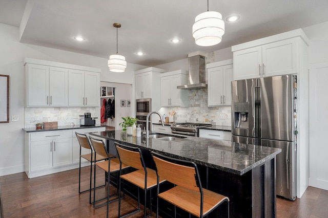 735 N Fox Hill Cir, Nixa, MO 65714 - kitchen featuring wall chimney exhaust hood, appliances with stainless steel finishes, a sink, backsplash, and recessed lighting