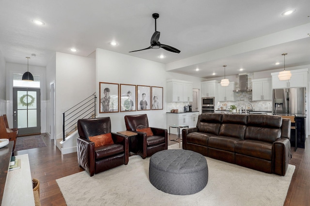 735 N Fox Hill Cir, Nixa, MO 65714 - living room featuring wood finished floors, a ceiling fan, stairway, and recessed lighting