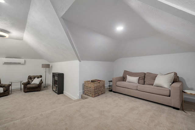735 N Fox Hill Cir, Nixa, MO 65714 - living area featuring a wall unit AC, lofted ceiling, carpet, a textured ceiling, and baseboards