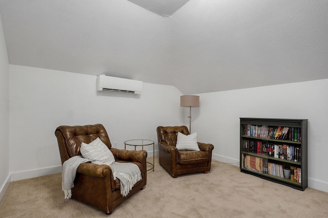 735 N Fox Hill Cir, Nixa, MO 65714 - sitting room featuring an AC wall unit, vaulted ceiling, carpet, and baseboards