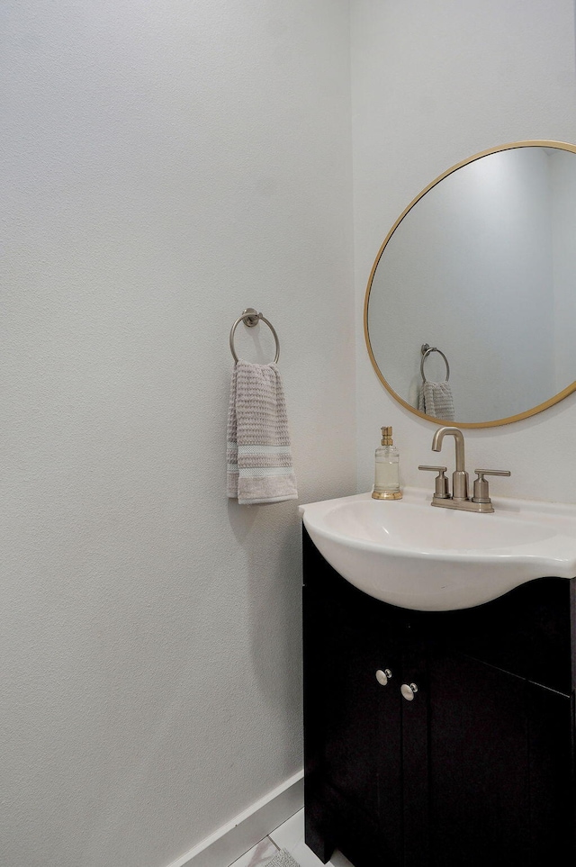 735 N Fox Hill Cir, Nixa, MO 65714 - bathroom with vanity and baseboards