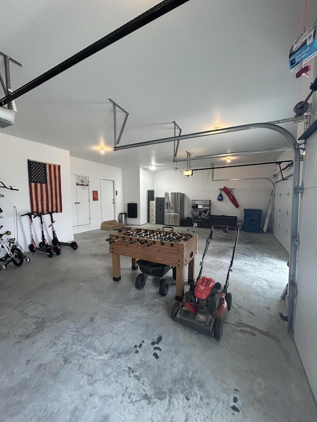 735 N Fox Hill Cir, Nixa, MO 65714 - garage featuring a garage door opener