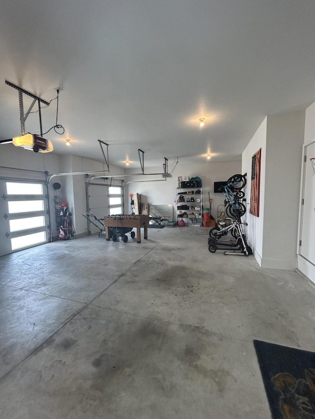 735 N Fox Hill Cir, Nixa, MO 65714 - garage featuring a garage door opener