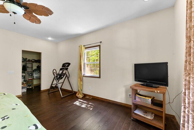 620 Dartmoore Dr, Rogersville, MO 65742 - exercise room with dark wood-style floors, baseboards, and ceiling fan