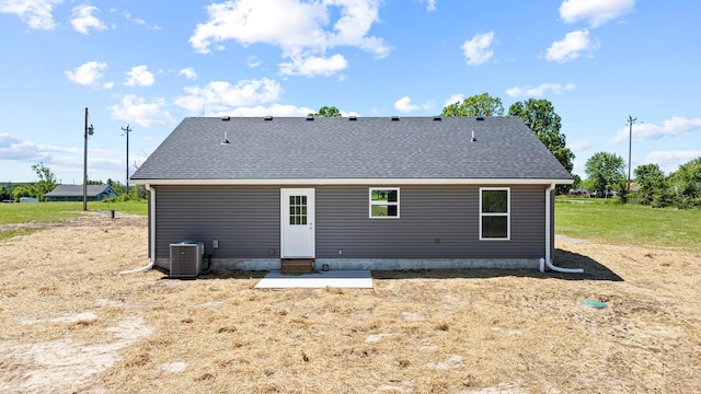 1079 Wiseman Rd, Marshfield, MO 65706 - rear view of property with central AC, entry steps, a patio, and a shingled roof