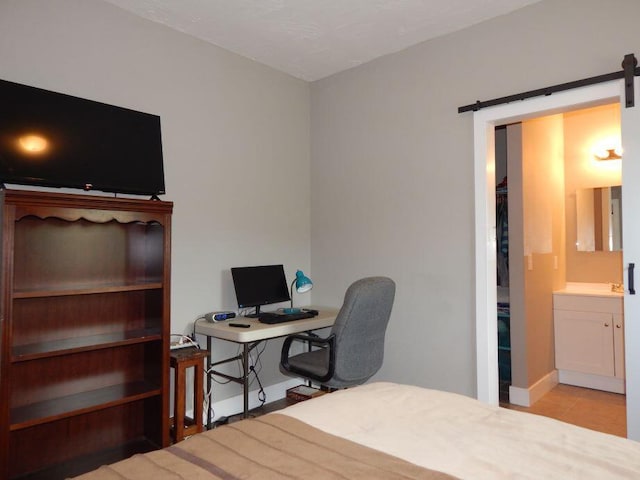 510 Kenny St, Ava, MO 65608 - tiled home office featuring a barn door and baseboards