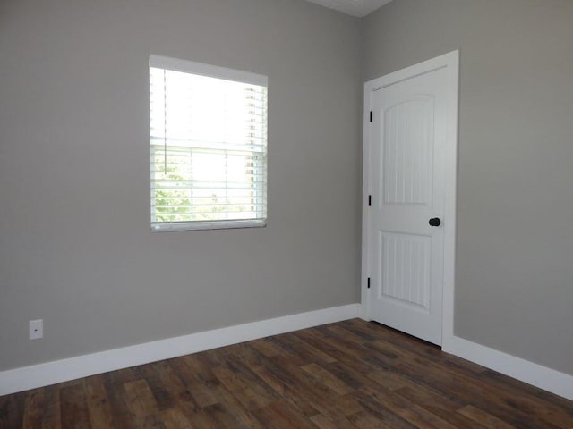 510 Kenny St, Ava, MO 65608 - spare room with dark wood finished floors and baseboards