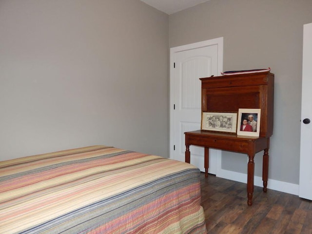 510 Kenny St, Ava, MO 65608 - bedroom with dark wood-type flooring and baseboards