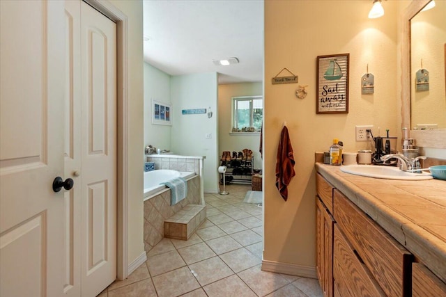 657 Plentywood Ln, Gainesville, MO 65655 - full bathroom featuring vanity, a bath, and tile patterned flooring