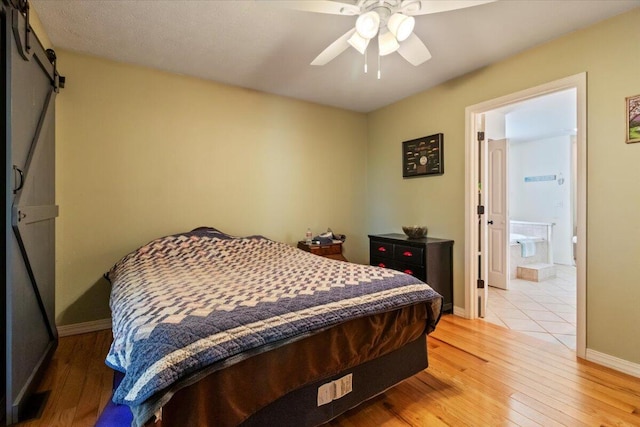 657 Plentywood Ln, Gainesville, MO 65655 - bedroom featuring light wood finished floors, baseboards, and ceiling fan