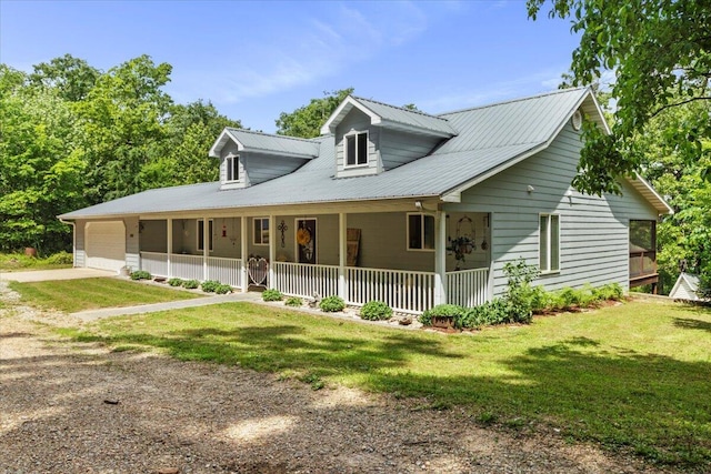657 Plentywood Ln, Gainesville, MO 65655 - view of front of property featuring concrete driveway, covered porch, an attached garage, and a front yard