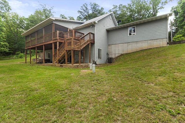 657 Plentywood Ln, Gainesville, MO 65655 - back of house featuring stairs, a wooden deck, a lawn, a sunroom, and central AC