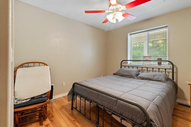 657 Plentywood Ln, Gainesville, MO 65655 - bedroom featuring light wood-type flooring, baseboards, and a ceiling fan