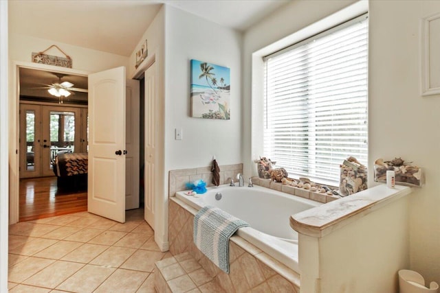 657 Plentywood Ln, Gainesville, MO 65655 - ensuite bathroom with a bath, tile patterned flooring, and french doors