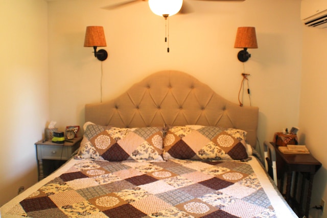 821 NW B Hwy, Osceola, MO 64776 - bedroom featuring an AC wall unit and carpet
