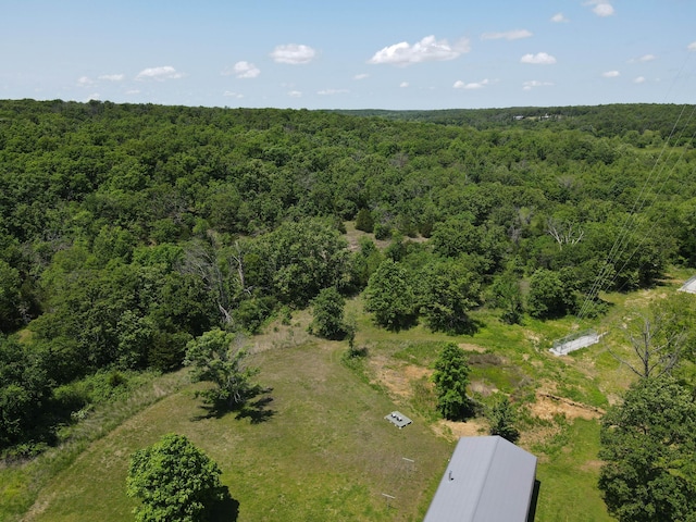 821 NW B Hwy, Osceola, MO 64776 - aerial view of property and surrounding area with a forest