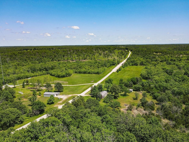 821 NW B Hwy, Osceola, MO 64776 - aerial view of property and surrounding area featuring a forest