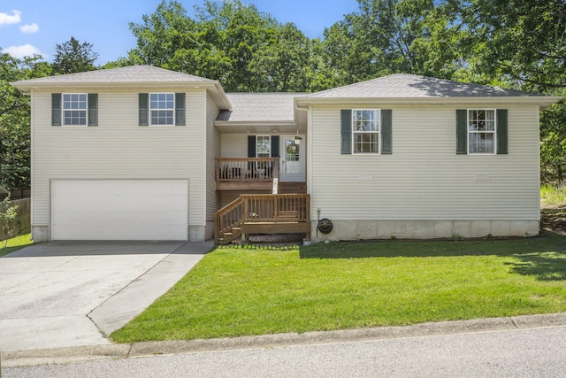 485 Eagle Dr, Forsyth, MO 65653 - view of front of home featuring a garage, a front lawn, concrete driveway, and a porch