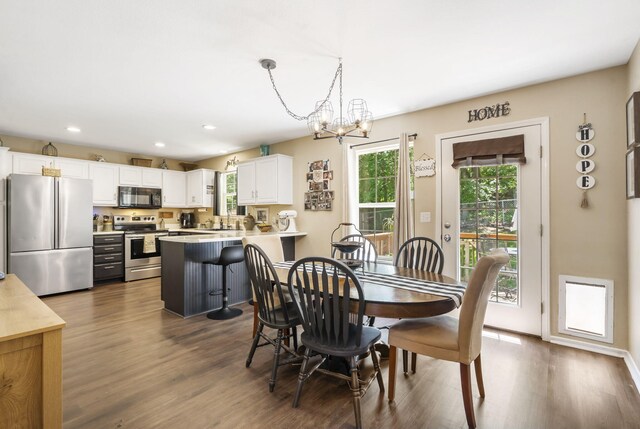 485 Eagle Dr, Forsyth, MO 65653 - dining area featuring a chandelier, recessed lighting, and dark wood-type flooring