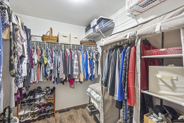485 Eagle Dr, Forsyth, MO 65653 - walk in closet featuring wood finished floors