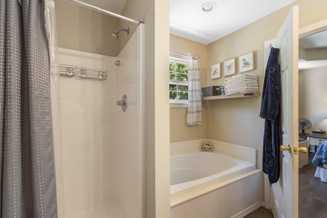485 Eagle Dr, Forsyth, MO 65653 - full bath featuring a bath, curtained shower, and wood finished floors