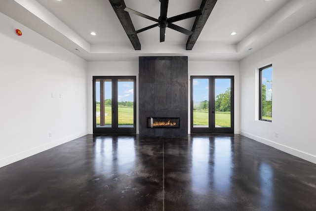 13213 State Highway M, Billings, MO 65610 - unfurnished living room with healthy amount of natural light, concrete flooring, recessed lighting, a tile fireplace, and beam ceiling