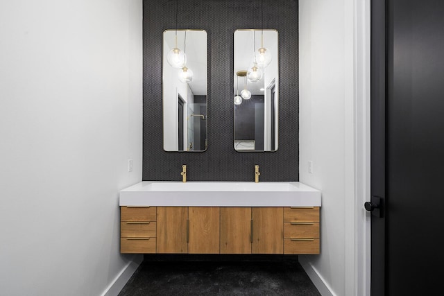 13213 State Highway M, Billings, MO 65610 - bathroom featuring baseboards and double vanity