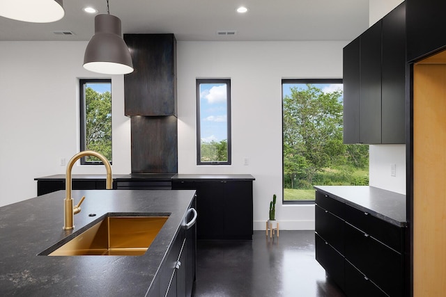 13213 State Highway M, Billings, MO 65610 - kitchen featuring dark cabinetry, finished concrete floors, recessed lighting, decorative light fixtures, and modern cabinets