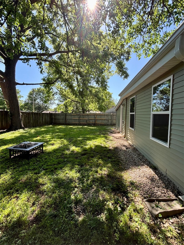 2510 W Madison St, Springfield, MO 65802 - view of yard featuring an outdoor fire pit