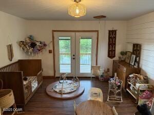 411 N Main St, Diamond, MO 64840 - living area with wood finished floors and french doors