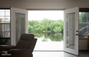 411 N Main St, Diamond, MO 64840 - entryway featuring plenty of natural light